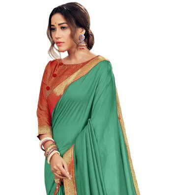 Vichitra Turquoise Color Saree With Blouse Piece by MGC